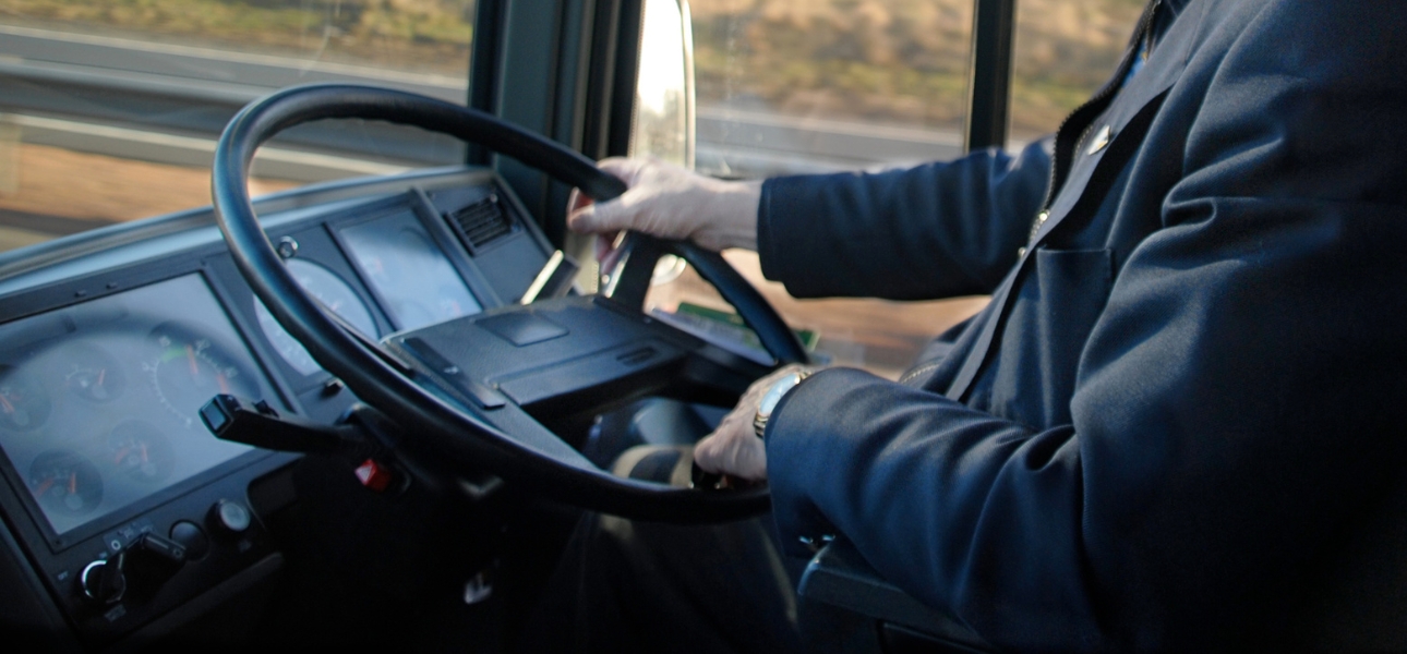 A man operating a bus