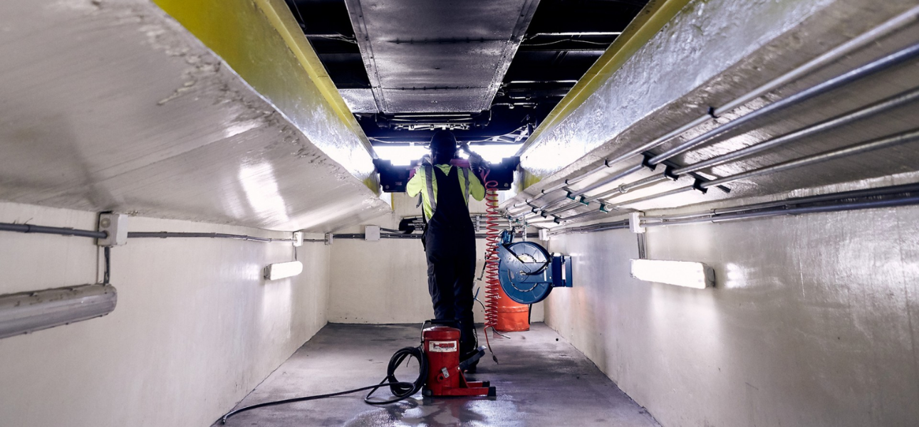 A man repairing a truck