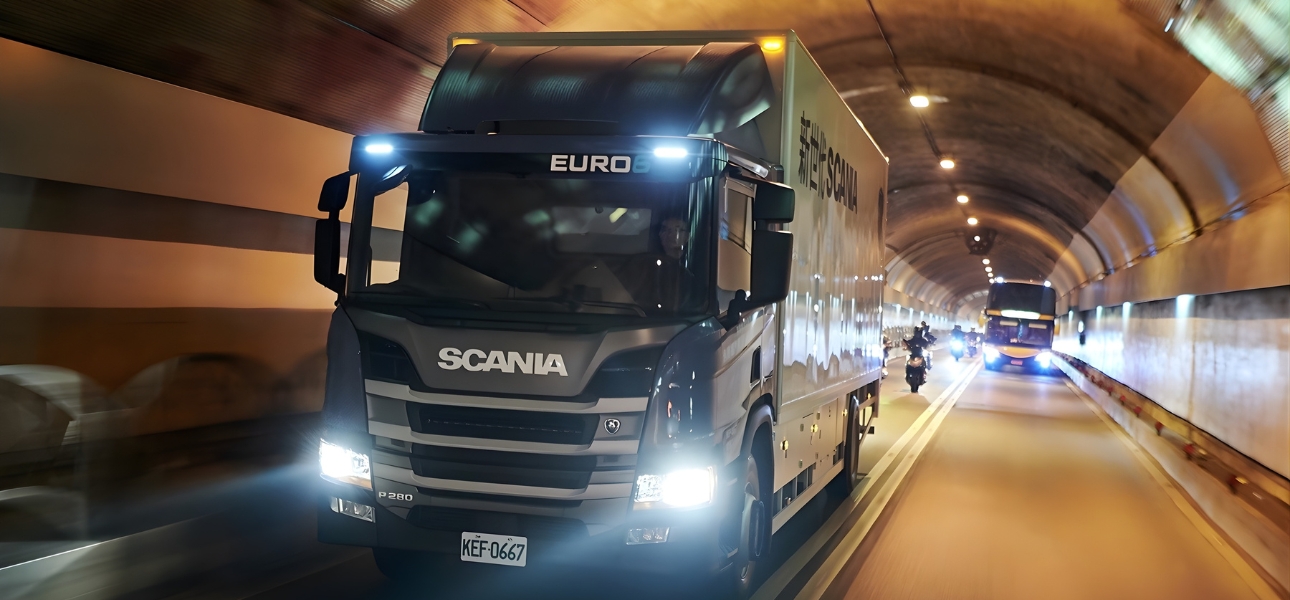 Black Scania Truck inside a tunnel