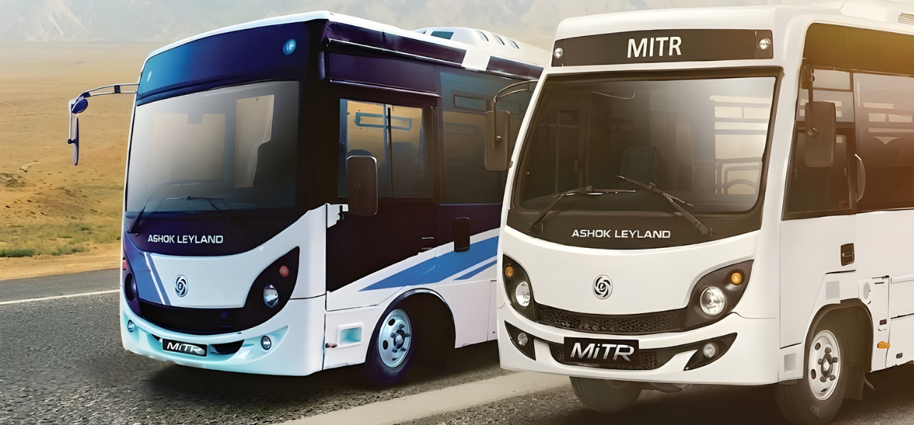 Two Ashok Leyland buses (GAZL & MITR) parked side by side on the road.