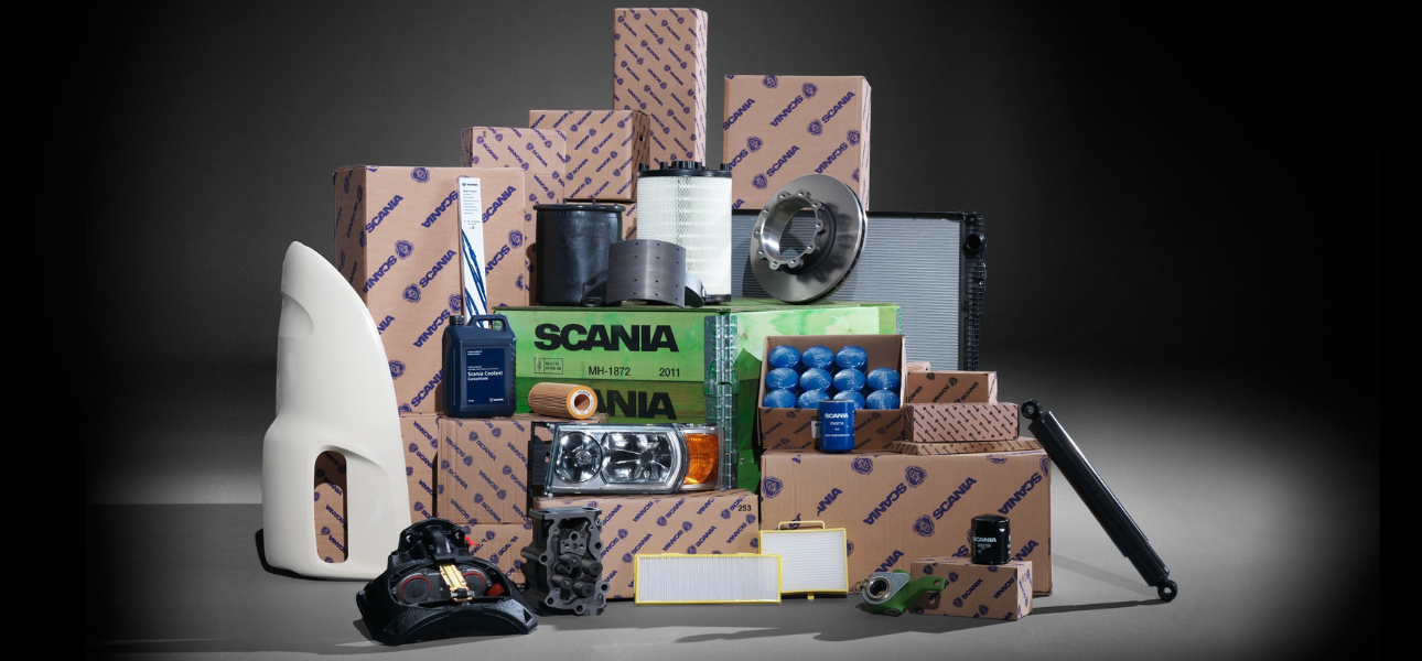 A stack of boxes topped with Scania parts